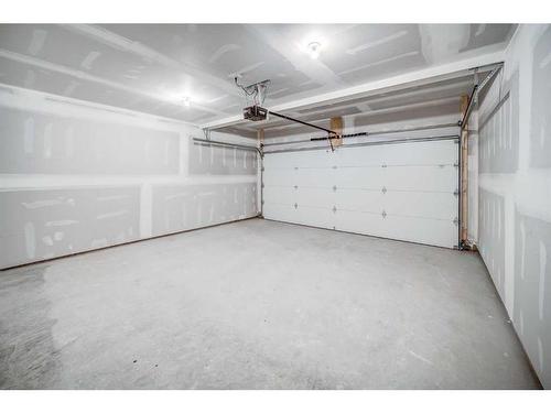 43 Lucas Way Nw, Calgary, AB - Indoor Photo Showing Garage