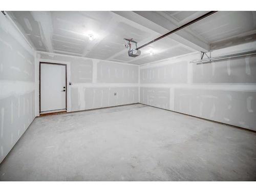 43 Lucas Way Nw, Calgary, AB - Indoor Photo Showing Garage