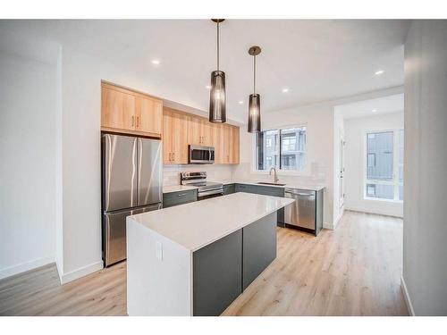 43 Lucas Way Nw, Calgary, AB - Indoor Photo Showing Kitchen With Upgraded Kitchen