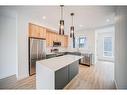 43 Lucas Way Nw, Calgary, AB  - Indoor Photo Showing Kitchen With Upgraded Kitchen 