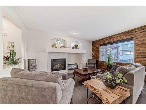 866 Auburn Bay Boulevard Se, Calgary, AB - Indoor Photo Showing Living Room With Fireplace