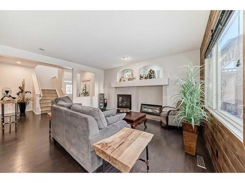 866 Auburn Bay Boulevard Se, Calgary, AB - Indoor Photo Showing Living Room With Fireplace