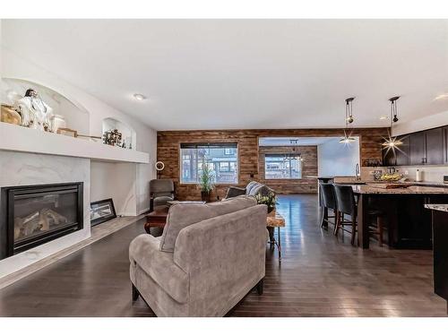 866 Auburn Bay Boulevard Se, Calgary, AB - Indoor Photo Showing Living Room With Fireplace