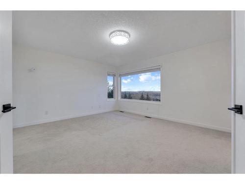 138 Hamptons Heights Nw, Calgary, AB - Indoor Photo Showing Other Room