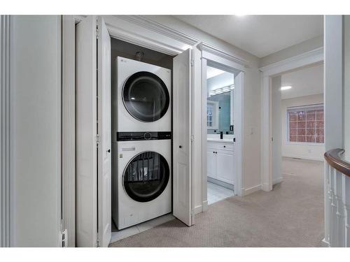 138 Hamptons Heights Nw, Calgary, AB - Indoor Photo Showing Laundry Room