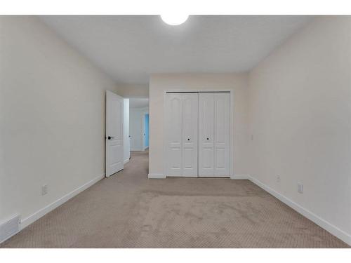 138 Hamptons Heights Nw, Calgary, AB - Indoor Photo Showing Other Room