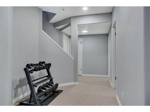 138 Hamptons Heights Nw, Calgary, AB - Indoor Photo Showing Other Room