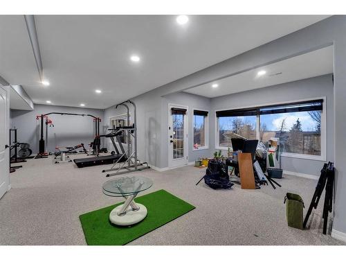 138 Hamptons Heights Nw, Calgary, AB - Indoor Photo Showing Gym Room