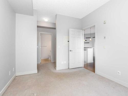 302-1408 17 Street Se, Calgary, AB - Indoor Photo Showing Other Room