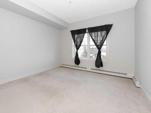 302-1408 17 Street Se, Calgary, AB - Indoor Photo Showing Other Room