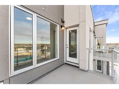 405-660 Shawnee Square Sw, Calgary, AB - Outdoor With Balcony With Exterior