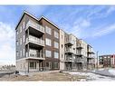 405-660 Shawnee Square Sw, Calgary, AB  - Outdoor With Balcony With Facade 