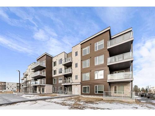 405-660 Shawnee Square Sw, Calgary, AB - Outdoor With Balcony With Facade