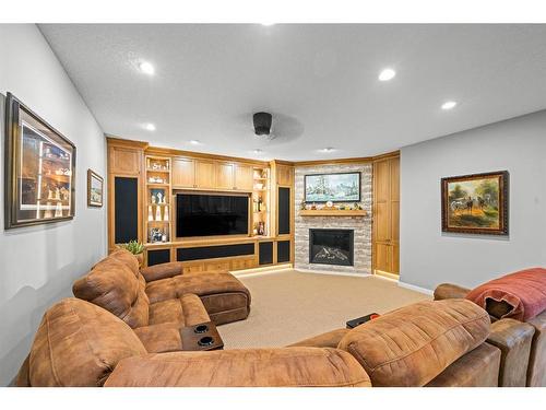 263010 Butte Hills Way, Rural Rocky View County, AB - Indoor Photo Showing Living Room With Fireplace