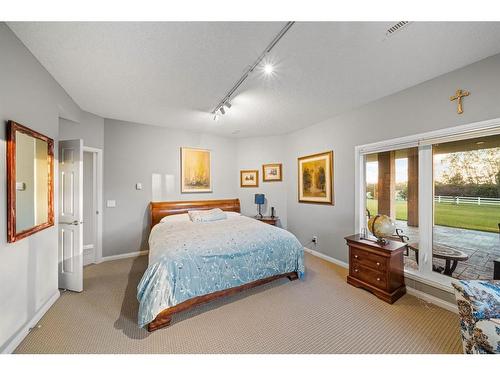 263010 Butte Hills Way, Rural Rocky View County, AB - Indoor Photo Showing Bedroom