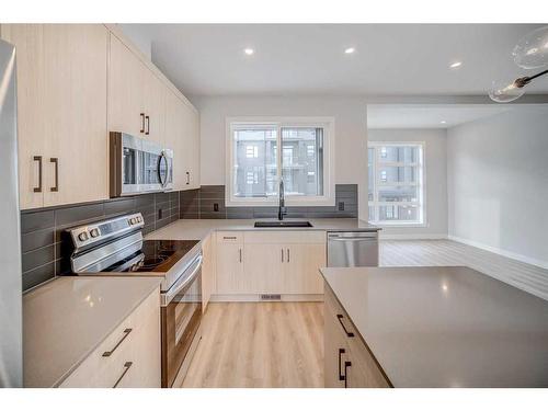 37 Lucas Way Nw, Calgary, AB - Indoor Photo Showing Kitchen