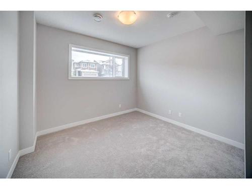 37 Lucas Way Nw, Calgary, AB - Indoor Photo Showing Other Room