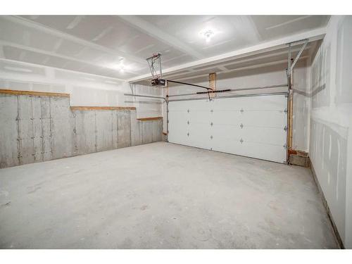 37 Lucas Way Nw, Calgary, AB - Indoor Photo Showing Garage