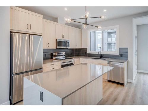 37 Lucas Way Nw, Calgary, AB - Indoor Photo Showing Kitchen