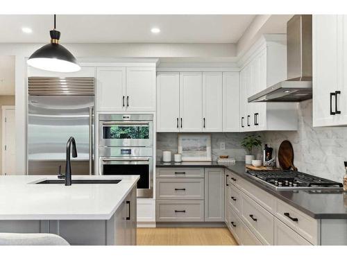 110-15 Cougar Ridge Landing Sw, Calgary, AB - Indoor Photo Showing Kitchen With Upgraded Kitchen