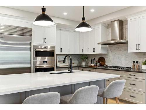 110-15 Cougar Ridge Landing Sw, Calgary, AB - Indoor Photo Showing Kitchen With Upgraded Kitchen