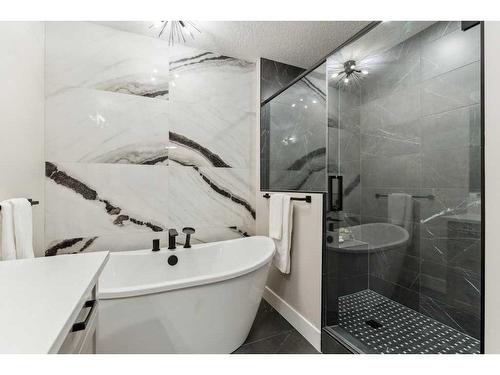 110-15 Cougar Ridge Landing Sw, Calgary, AB - Indoor Photo Showing Bathroom