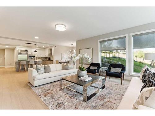 110-15 Cougar Ridge Landing Sw, Calgary, AB - Indoor Photo Showing Living Room