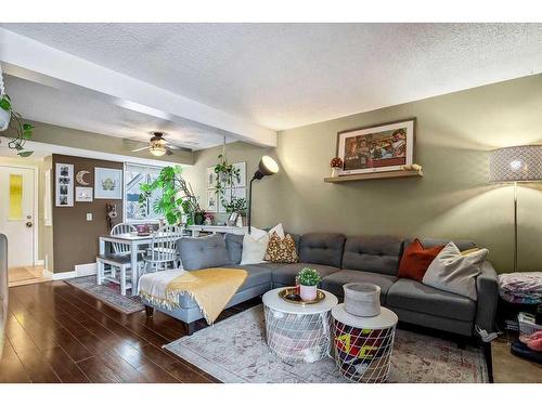 703-2520 Palliser Drive Sw, Calgary, AB - Indoor Photo Showing Living Room