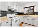 12 Glenport Road, Cochrane, AB  - Indoor Photo Showing Kitchen With Double Sink 