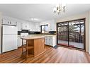 12 Glenport Road, Cochrane, AB  - Indoor Photo Showing Kitchen 