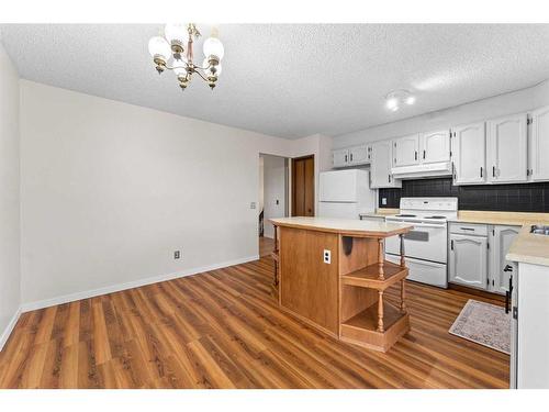 12 Glenport Road, Cochrane, AB - Indoor Photo Showing Kitchen