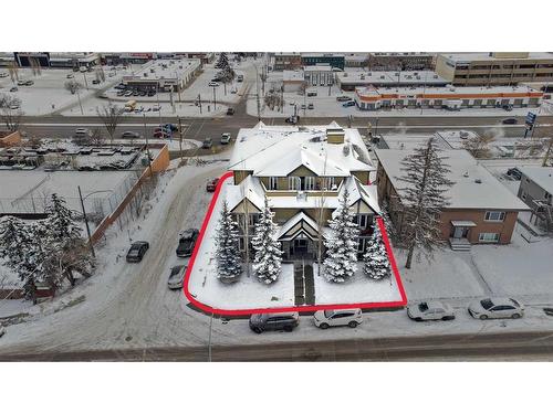 302-4704 Stanley Road Sw, Calgary, AB - Outdoor With Facade