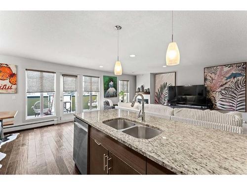 302-4704 Stanley Road Sw, Calgary, AB - Indoor Photo Showing Kitchen With Double Sink