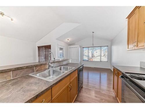 442 Sagewood Drive Sw, Airdrie, AB - Indoor Photo Showing Kitchen With Double Sink