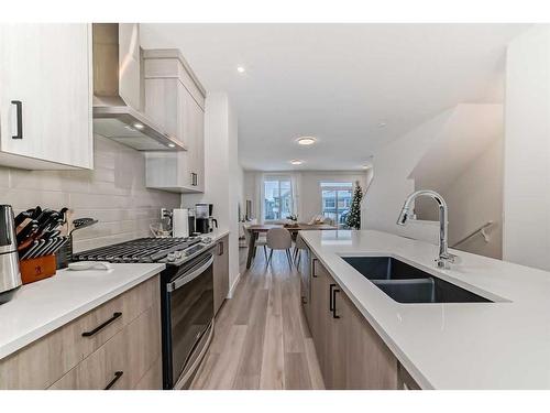 368 Seton Villas Se, Calgary, AB - Indoor Photo Showing Kitchen With Double Sink With Upgraded Kitchen