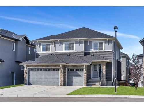 109 Kinniburgh Cove, Chestermere, AB - Outdoor With Facade