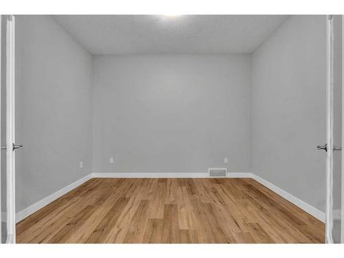 109 Kinniburgh Cove, Chestermere, AB - Indoor Photo Showing Other Room