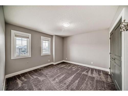 222 Ravenscroft Green Se, Airdrie, AB - Indoor Photo Showing Other Room