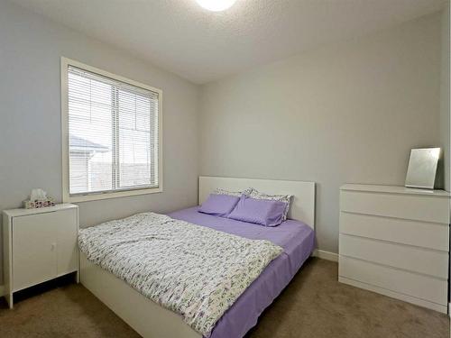 705-250 Sage Valley Road Nw, Calgary, AB - Indoor Photo Showing Bedroom