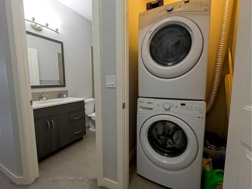 705-250 Sage Valley Road Nw, Calgary, AB - Indoor Photo Showing Laundry Room