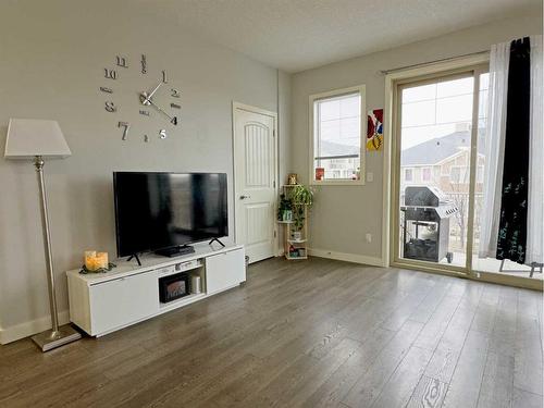 705-250 Sage Valley Road Nw, Calgary, AB - Indoor Photo Showing Living Room