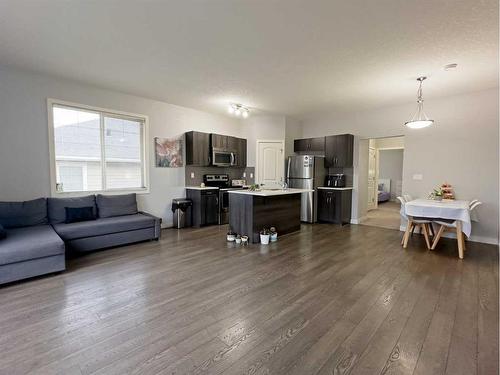 705-250 Sage Valley Road Nw, Calgary, AB - Indoor Photo Showing Living Room