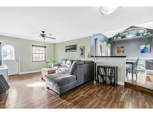 2210 23 Street, Nanton, AB - Indoor Photo Showing Living Room