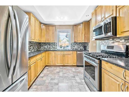 2210 23 Street, Nanton, AB - Indoor Photo Showing Kitchen With Upgraded Kitchen