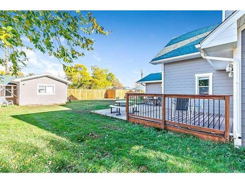 2210 23 Street, Nanton, AB - Outdoor With Deck Patio Veranda