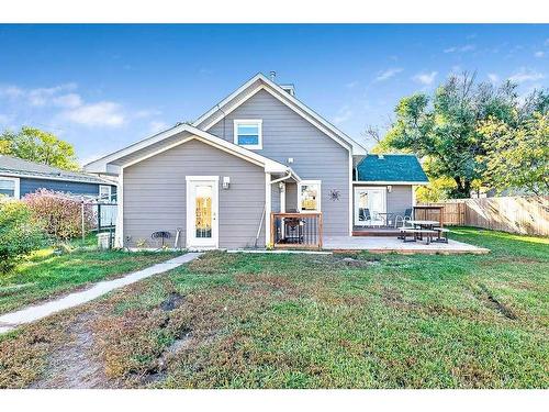 2210 23 Street, Nanton, AB - Outdoor With Deck Patio Veranda