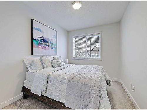 149 Rockyspring Grove Nw, Calgary, AB - Indoor Photo Showing Bedroom