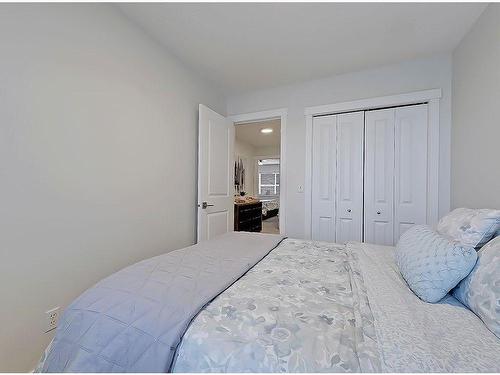 149 Rockyspring Grove Nw, Calgary, AB - Indoor Photo Showing Bedroom