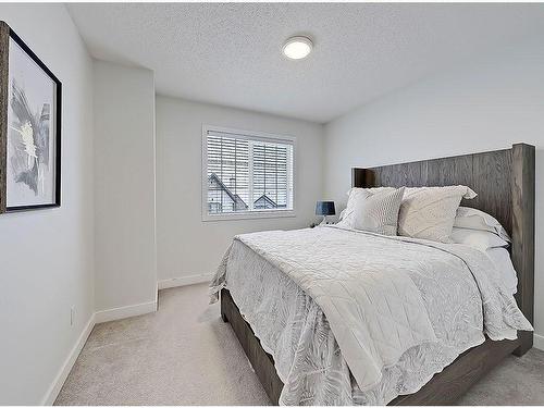 149 Rockyspring Grove Nw, Calgary, AB - Indoor Photo Showing Bedroom