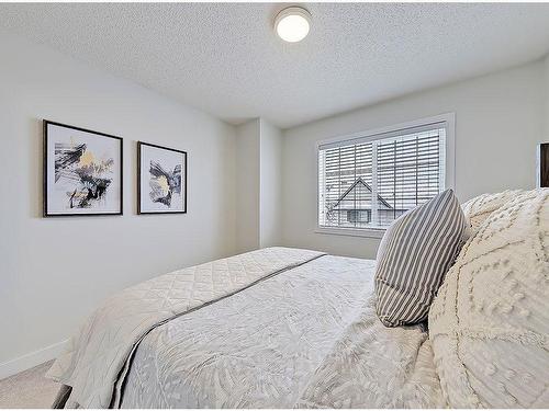 149 Rockyspring Grove Nw, Calgary, AB - Indoor Photo Showing Bedroom